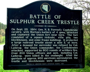 Photo of the historical marker for the battle at Sulphur Creek Trestle Bridge